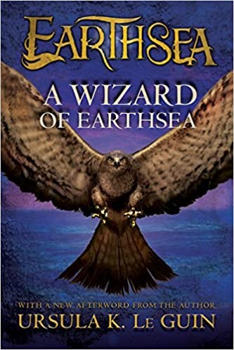 A Wizard of Earthsea book cover, a hawk with wings spread wide over a dark sea